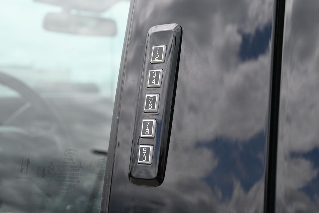 Used 2024 White Metallic Ford Limited image 13