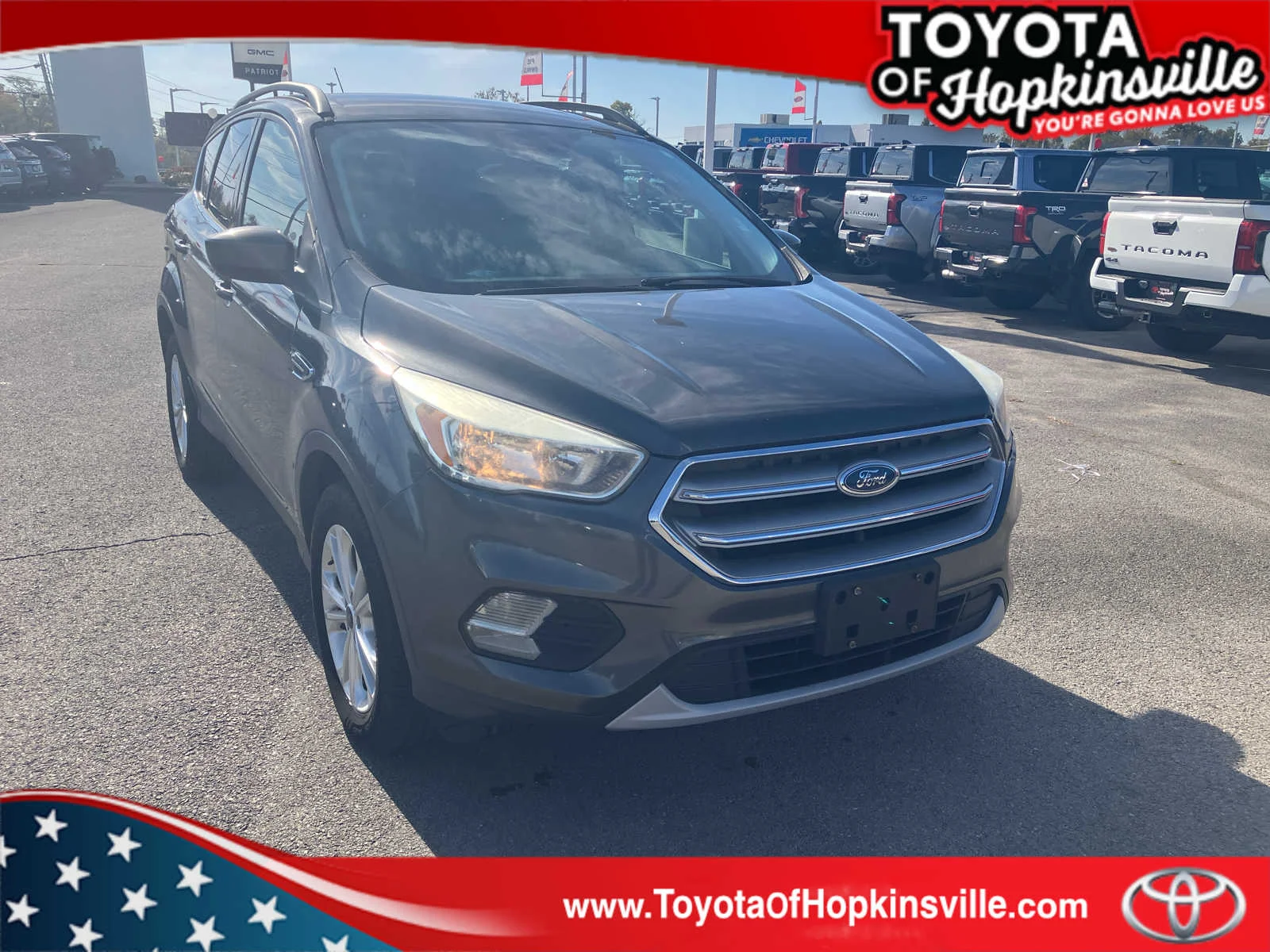 Used 2017 Magnetic Metallic Ford SE image 1
