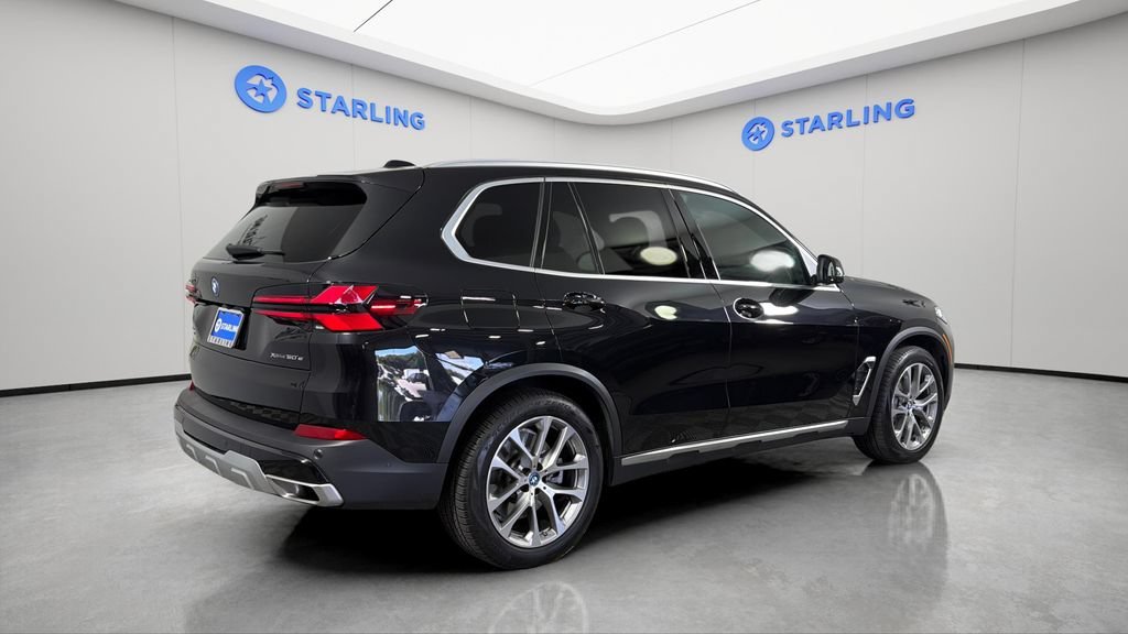 Used 2025 Black BMW xDrive50e image 9