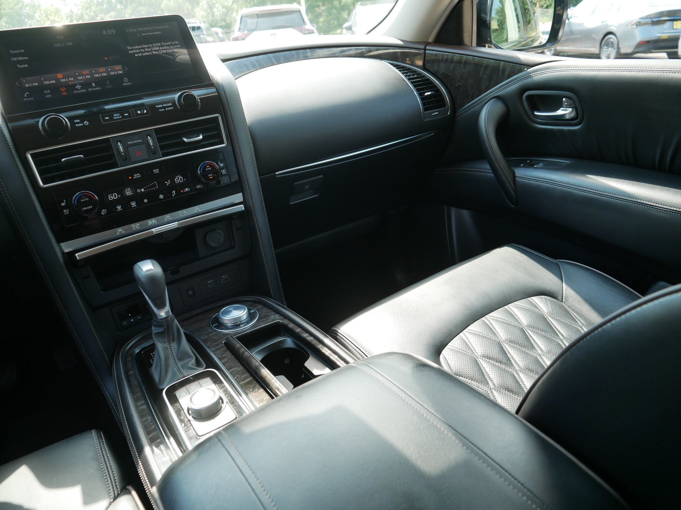 Used 2024 Super Black Nissan Platinum image 11