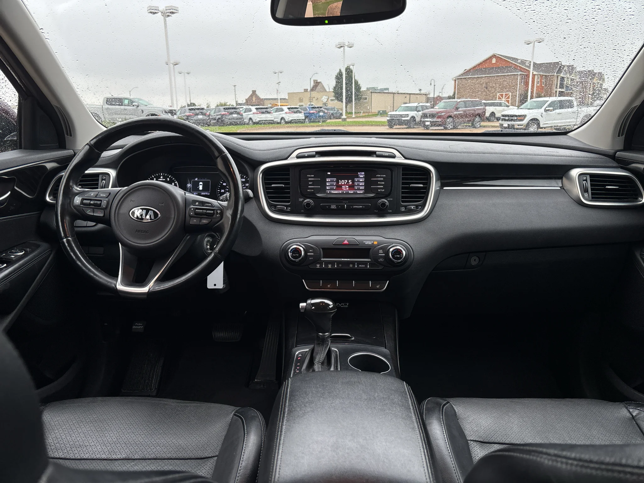 Used 2016 Kia Sorento EX with VIN 5XYPH4A52GG174679 for sale in Pella, IA