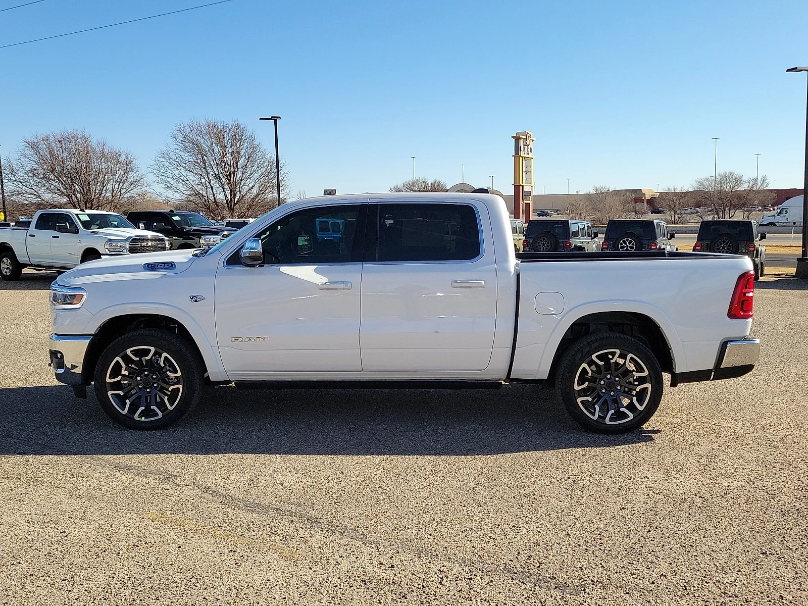 New 2026 Bright White Ram LIMITED LONGHORN CREW CAB 4X4 5