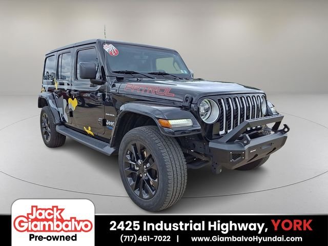 Used 2021 Black Jeep Unlimited Sahara 4xe image 1