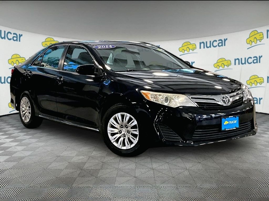 Used 2014 Gray Toyota LE image 1