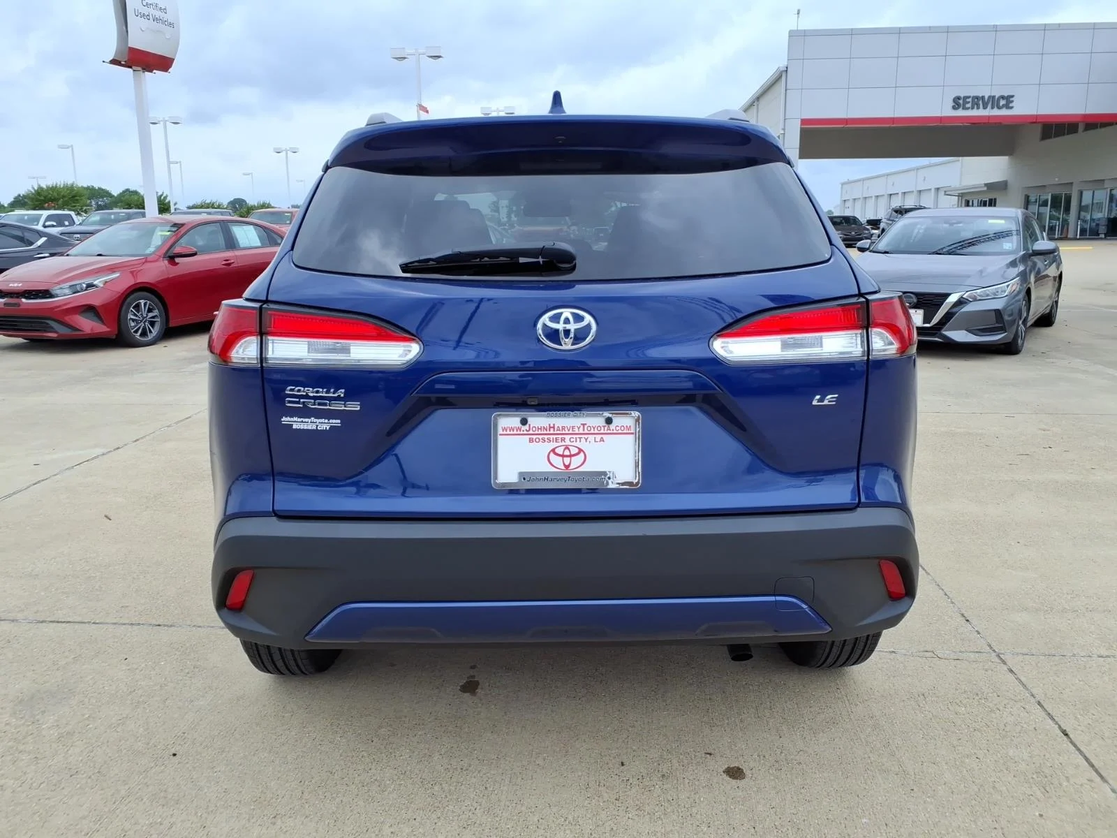 Used 2024 Blue Crush Metallic Toyota LE image 3