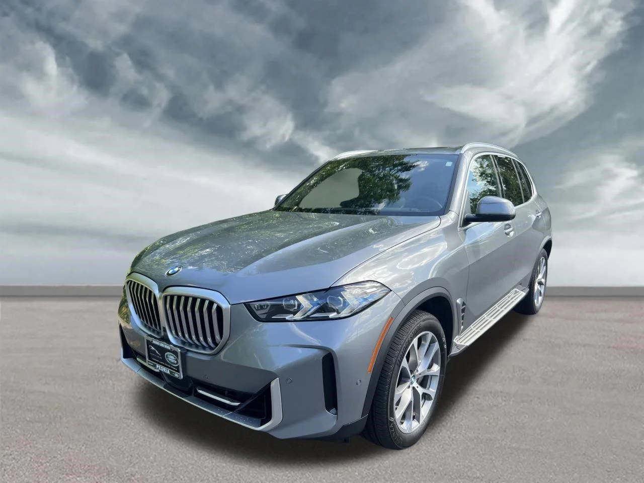 Used 2024 Skyscraper Grey Metallic BMW xDrive40i image 1