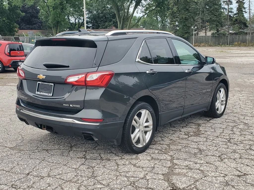 Used 2018 Chevrolet Equinox Premier with VIN 2GNAXWEX5J6186093 for sale in Clare, MI