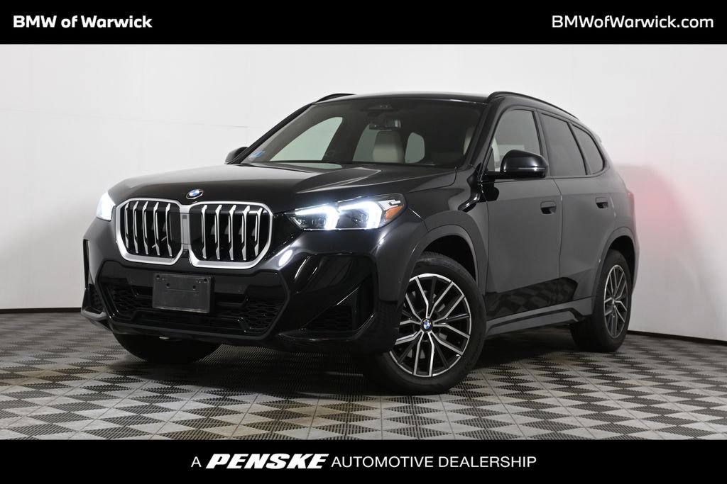 Used 2024 Black BMW xDrive28i image 1