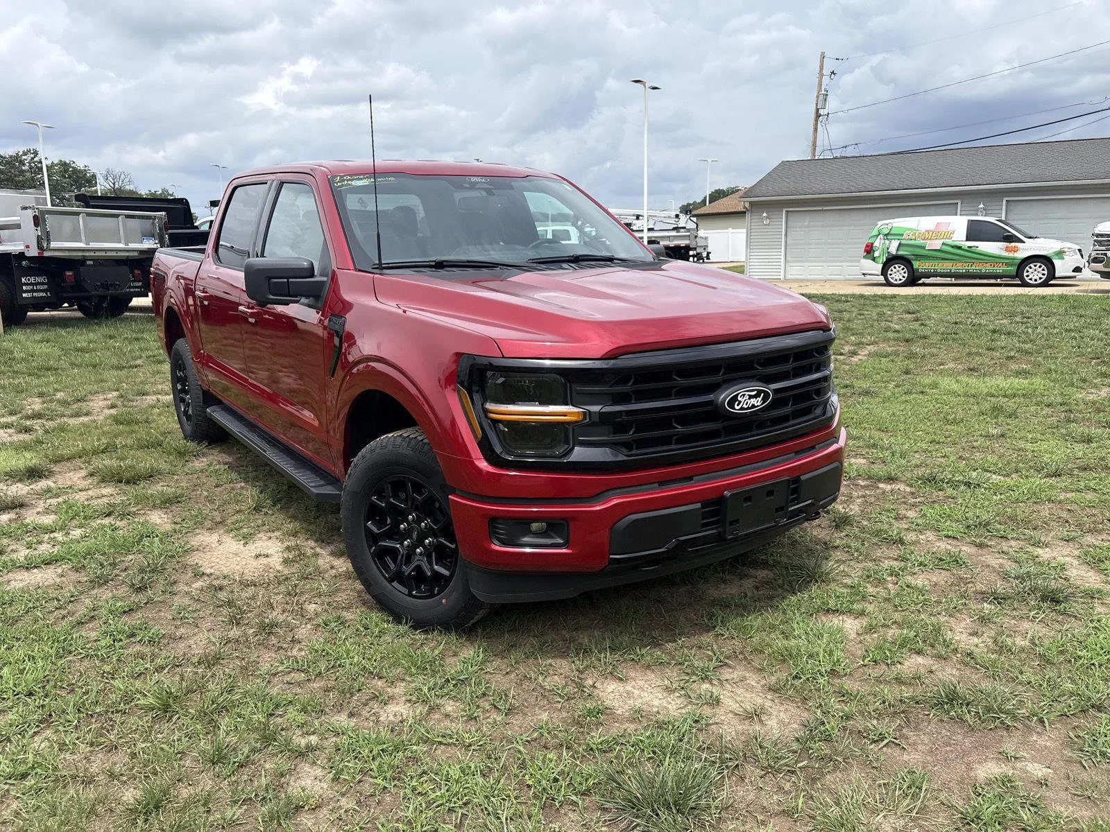Used 2024 Rapid Red Metallic Tinted Clearcoat Ford XLT image 3