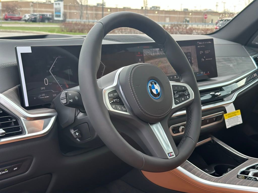 New 2026 Manhattan Green Metallic BMW xDrive50e image 17