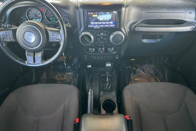 Used 2015 Black Clearcoat Jeep Unlimited Sport image 16