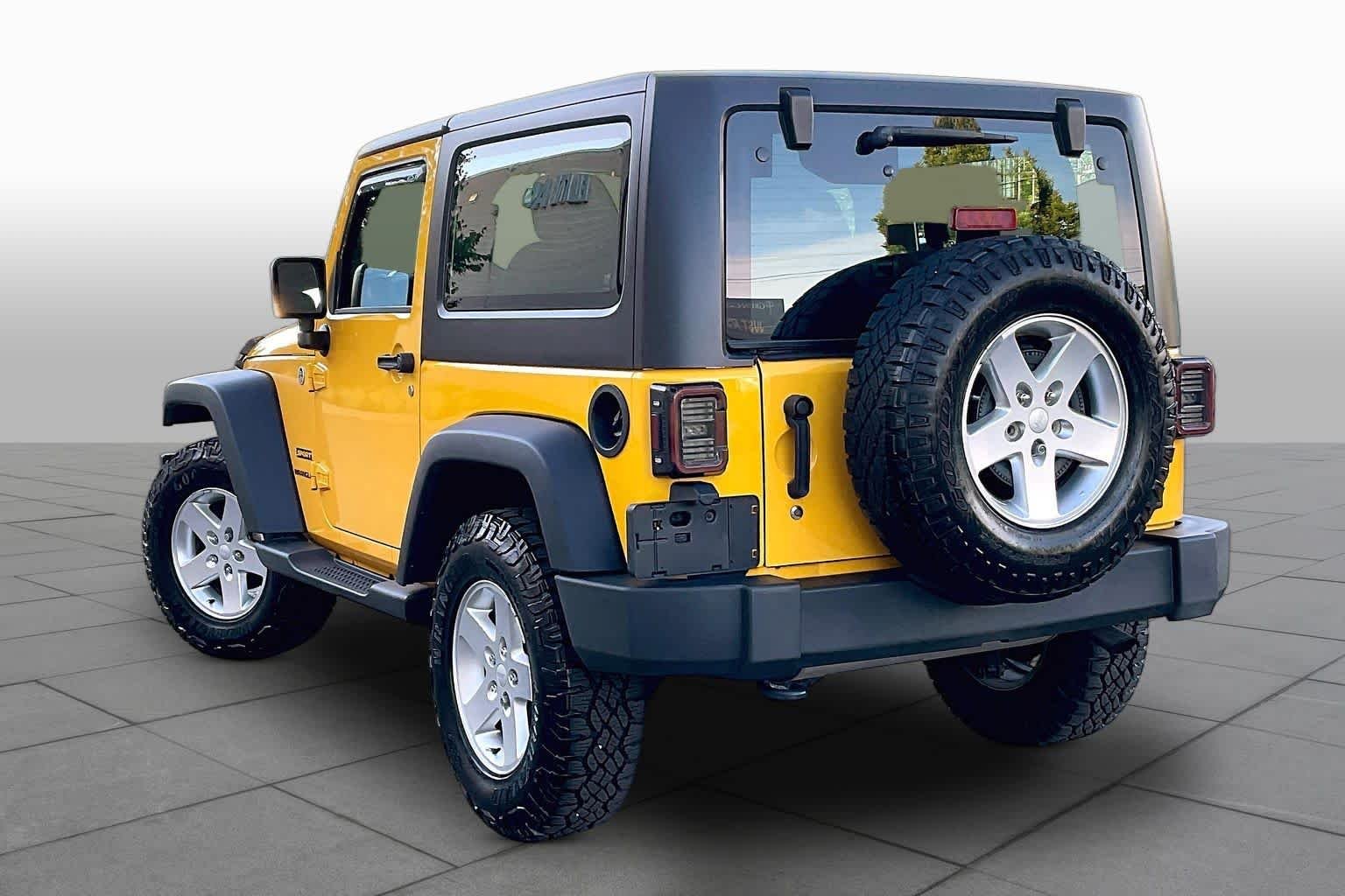 Used 2015 Baja Yellow Clearcoat Jeep Sport image 12