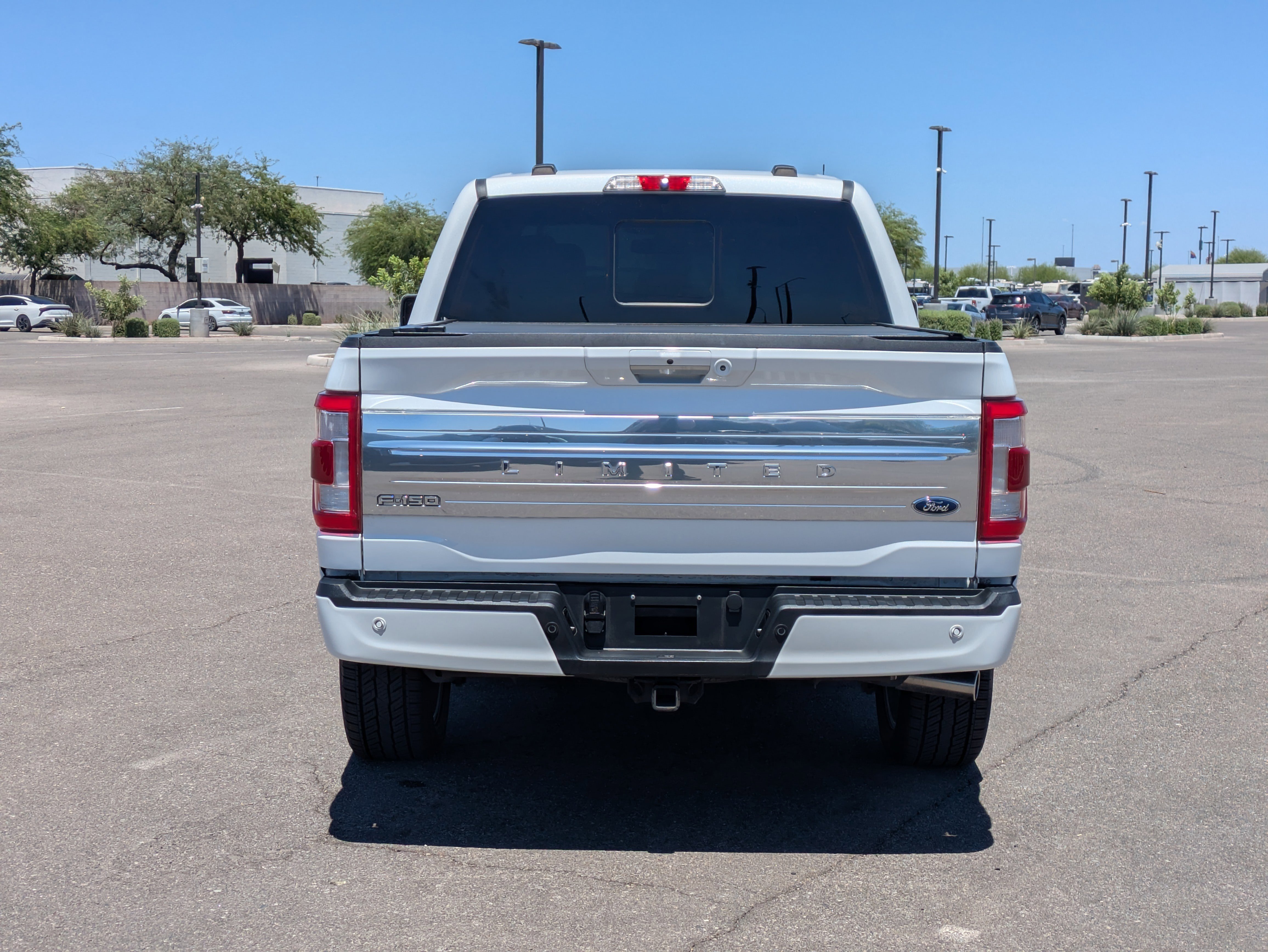 Used 2023 White Metallic Ford Limited image 4