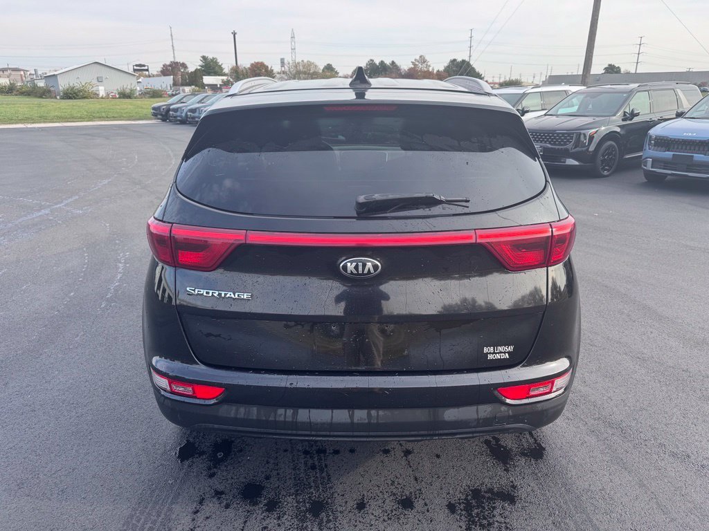 Used 2017 Black Cherry Kia LX image 6