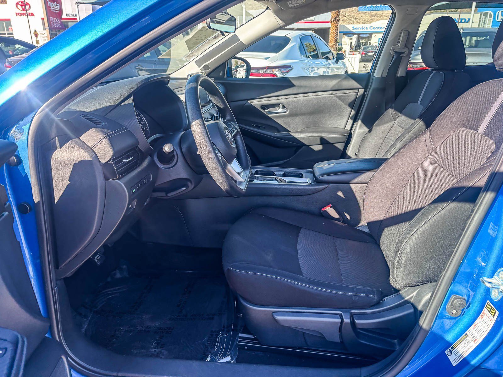 Used 2024 Electric Blue Metallic Nissan SV image 20