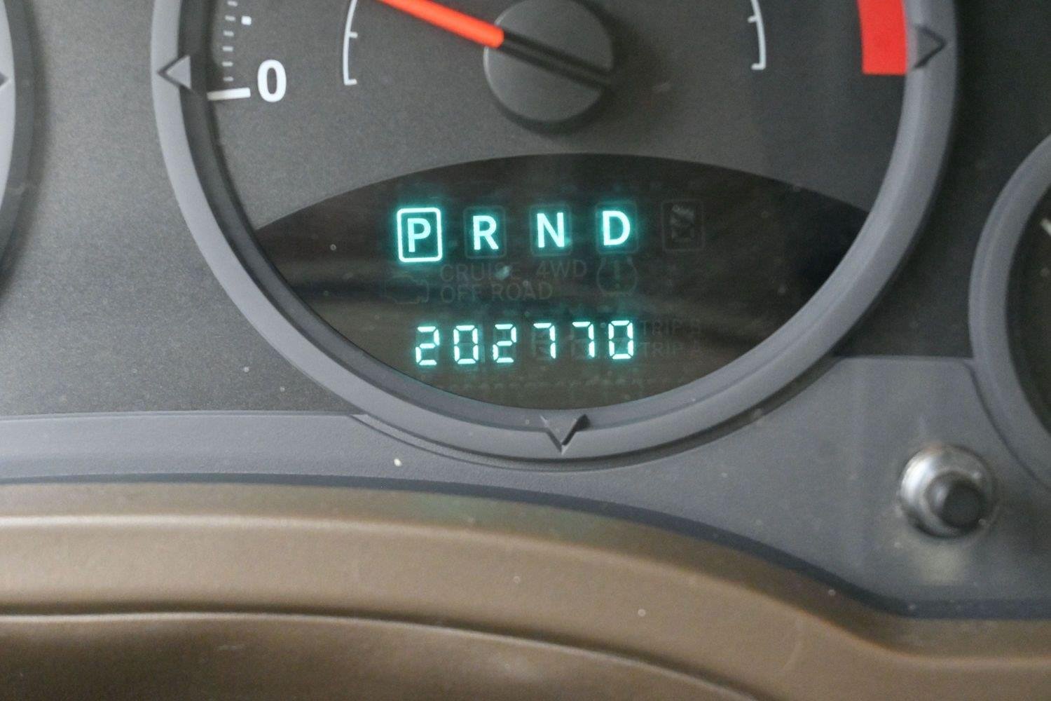 Used 2008 Light Khaki Metallic Jeep Sport image 16
