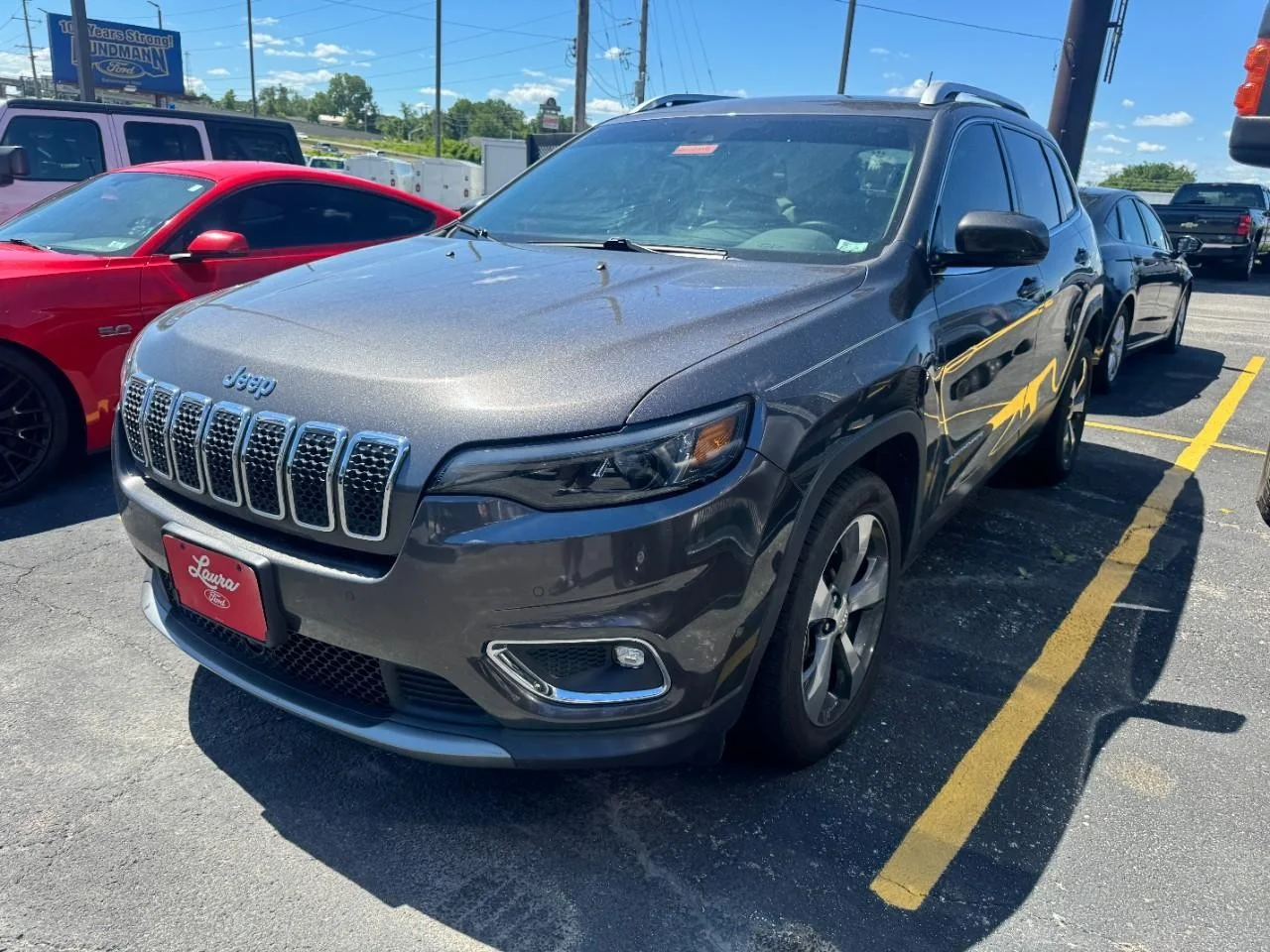 Used 2019 Granite Crystal Clearcoat Metallic Jeep Limited FWD image 6