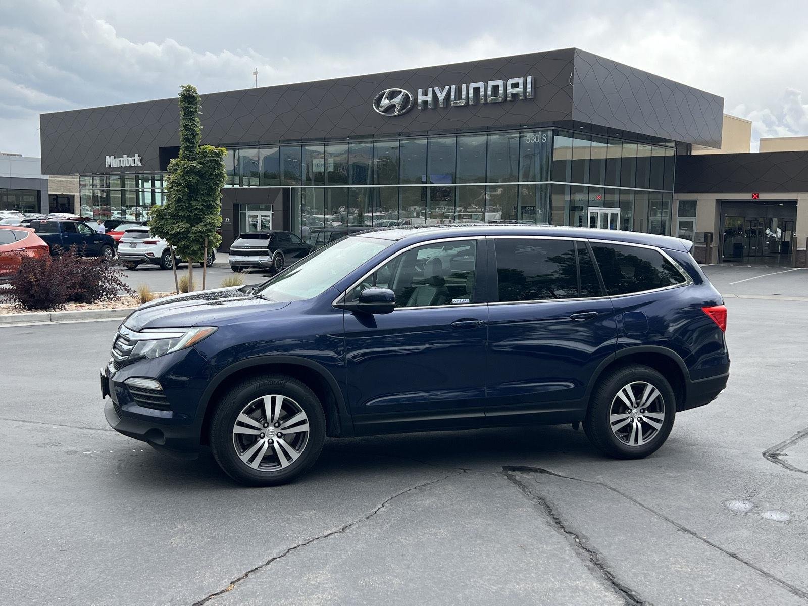 Used 2016 Blue Honda EX-L image 1