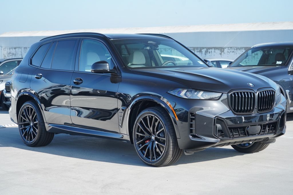 New 2026 Black Sapphire Metallic BMW sDrive40i image 3
