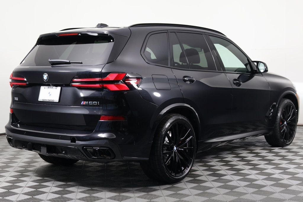 New 2026 Black Sapphire Metallic BMW M60i image 2