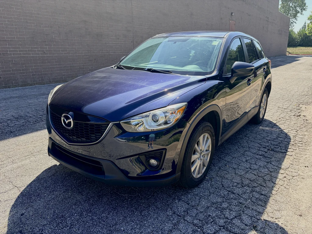 Used 2015 Deep Crystal Blue Mica Mazda Touring image 1