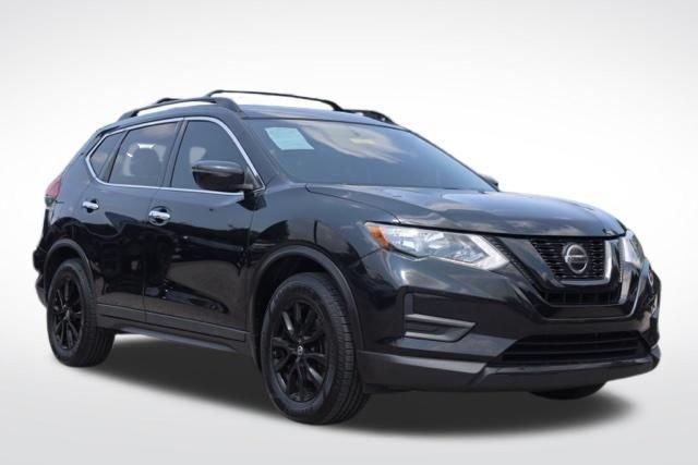 Used 2018 Magnetic Black Nissan SV image 1