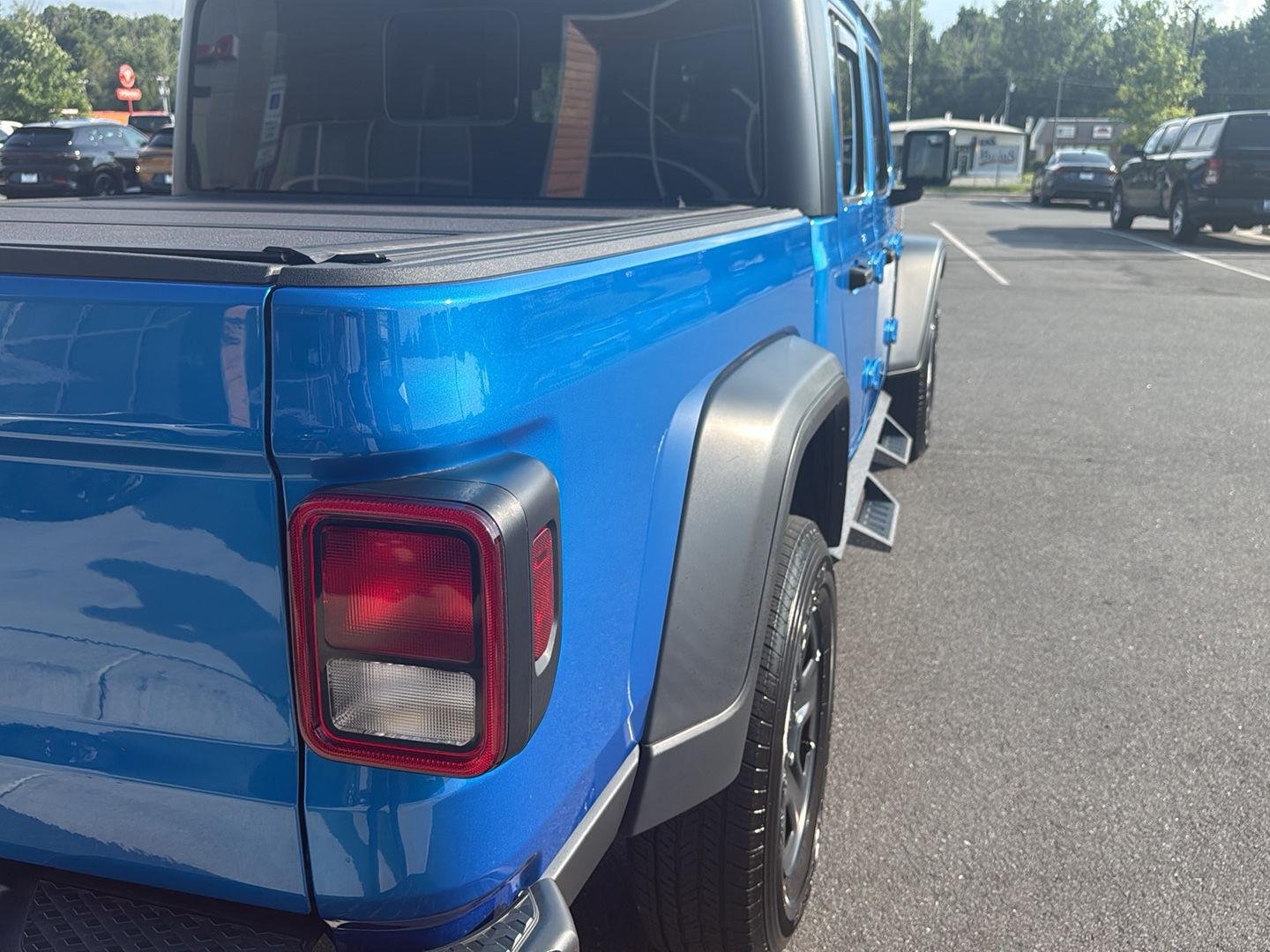 Used 2023 Hydro Blue Pearlcoat Jeep Sport image 9