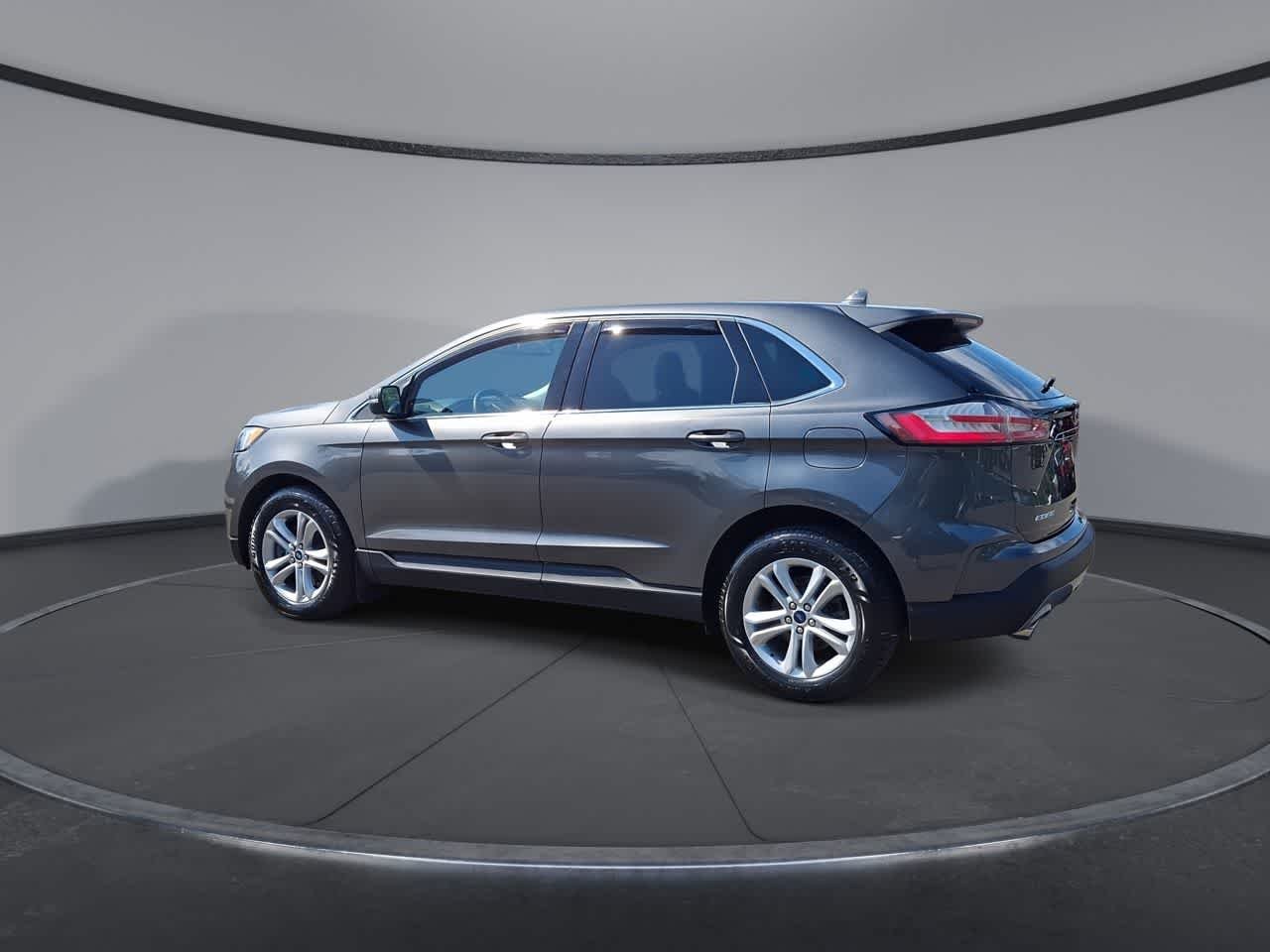 Used 2020 Magnetic Metallic Ford SEL image 6