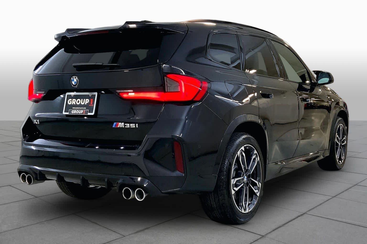 Certified Used 2026 Black Sapphire Metallic BMW M35i image 12