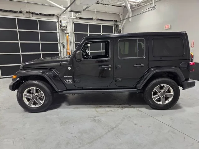 Used 2020 Black Jeep Unlimited Sahara image 4