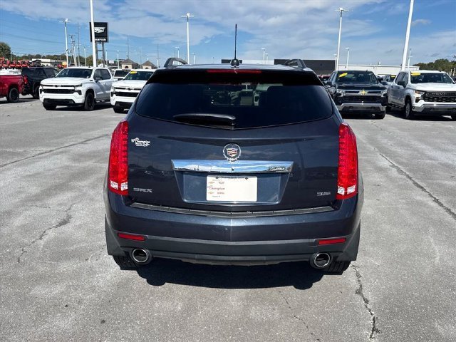 Used 2015 SAPPHIRE BLUE METALLIC Cadillac Base image 4