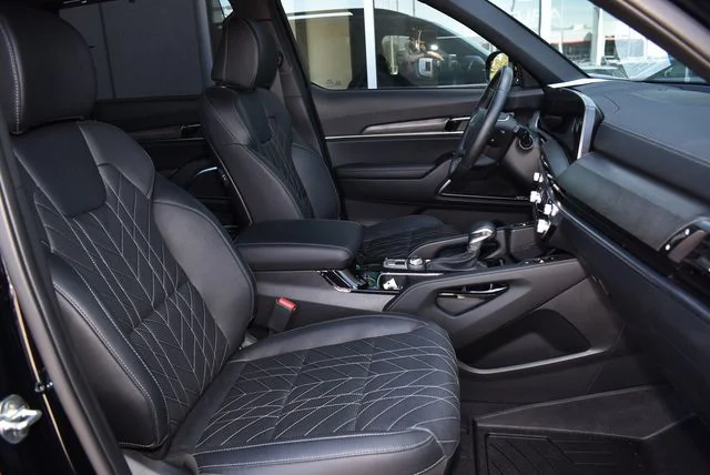 Used 2025 Ebony Black Kia SX X-Line image 13