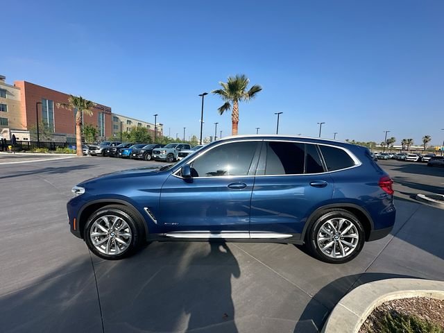 Used 2018 Blue BMW xDrive30i image 4