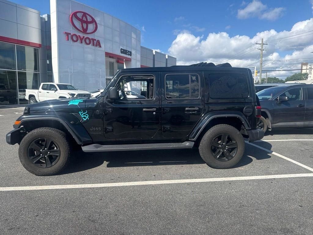 Used 2022 Black Jeep Unlimited Sahara Altitude image 1