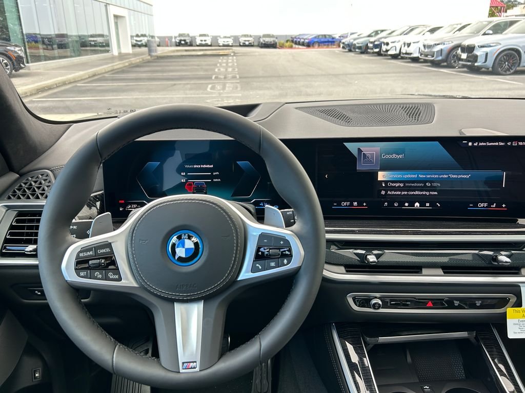 New 2026 Black Sapphire Metallic BMW xDrive50e image 17