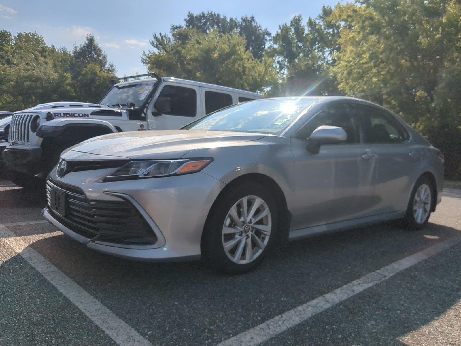 Used 2024 Celestial Silver Metallic Toyota LE image 6