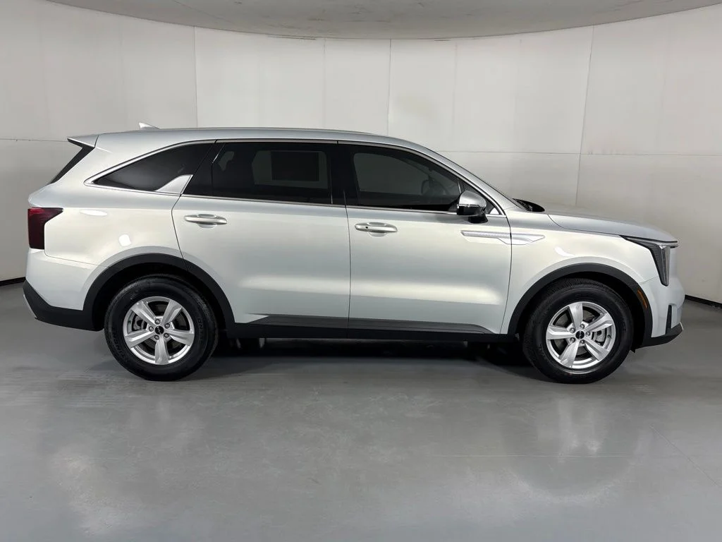 New 2026 Ivory Silver Kia LX image 9
