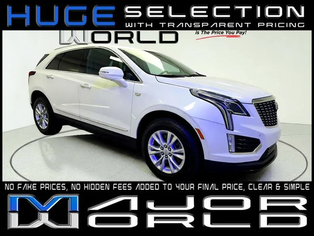 Used 2024 White Cadillac Luxury image 1