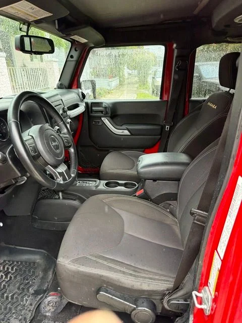 Used 2014 Red Jeep Unlimited Sahara image 26