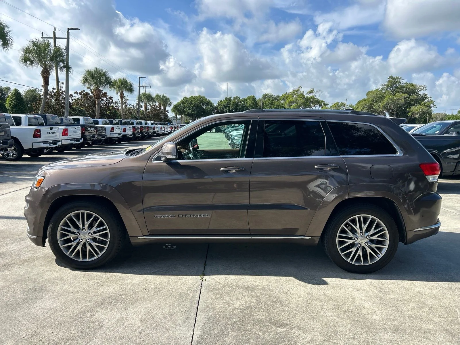Used 2018 Brown Metallic Jeep Summit image 2