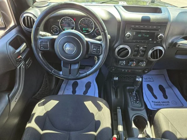 Used 2015 Black Jeep Unlimited Sport image 13