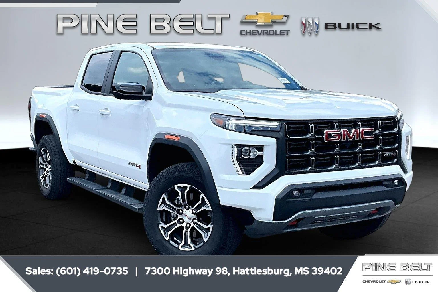 Used 2023 SUMMIT WHITE GMC 4WD AT4 image 1