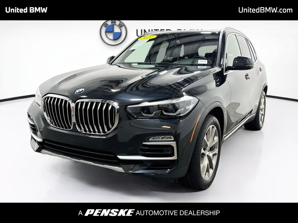 Used 2021 Black Sapphire Metallic BMW xDrive40i image 1