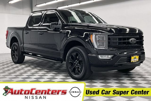 Used 2023 Agate Black Metallic Ford Lariat image 1