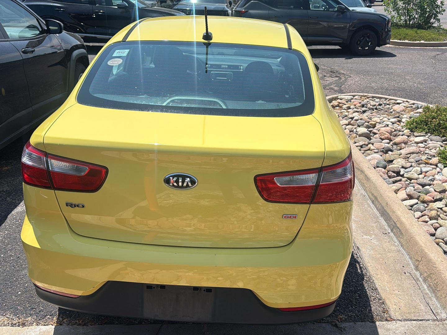 Used 2016 Digital Yellow Kia LX image 4