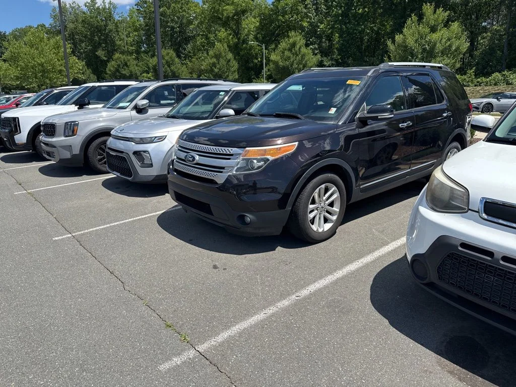 Used 2014 Brown Ford XLT image 1