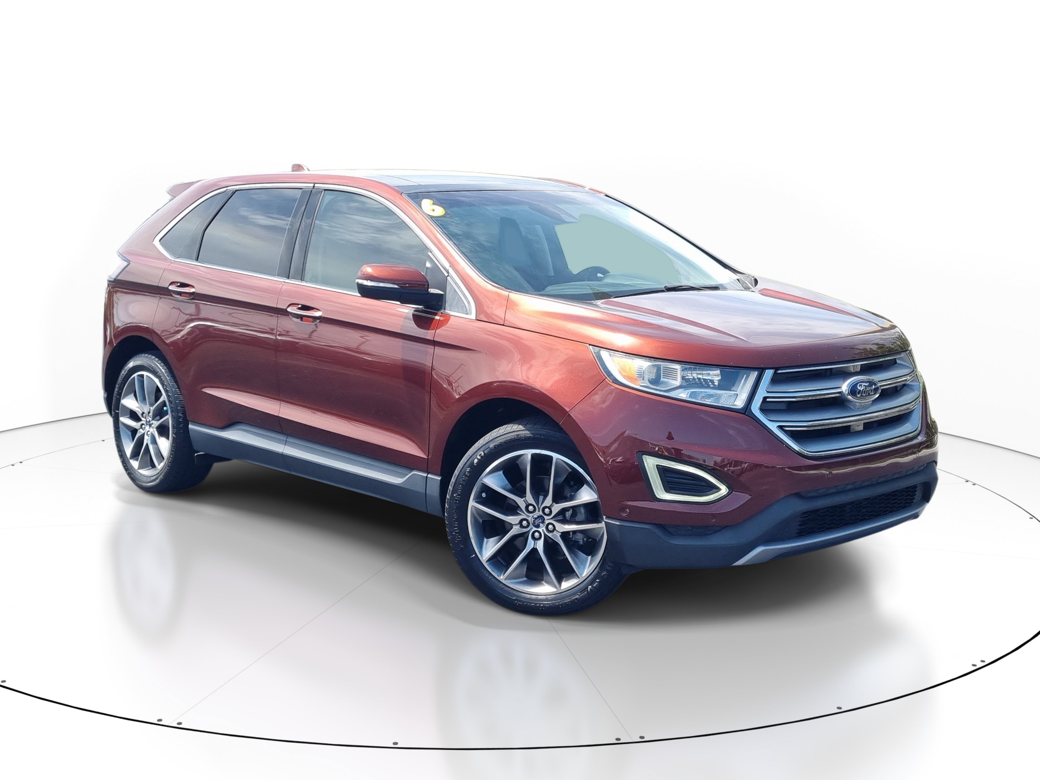 Used 2016 Bronze Fire Metallic Tinted Clearcoat Ford Titanium image 1