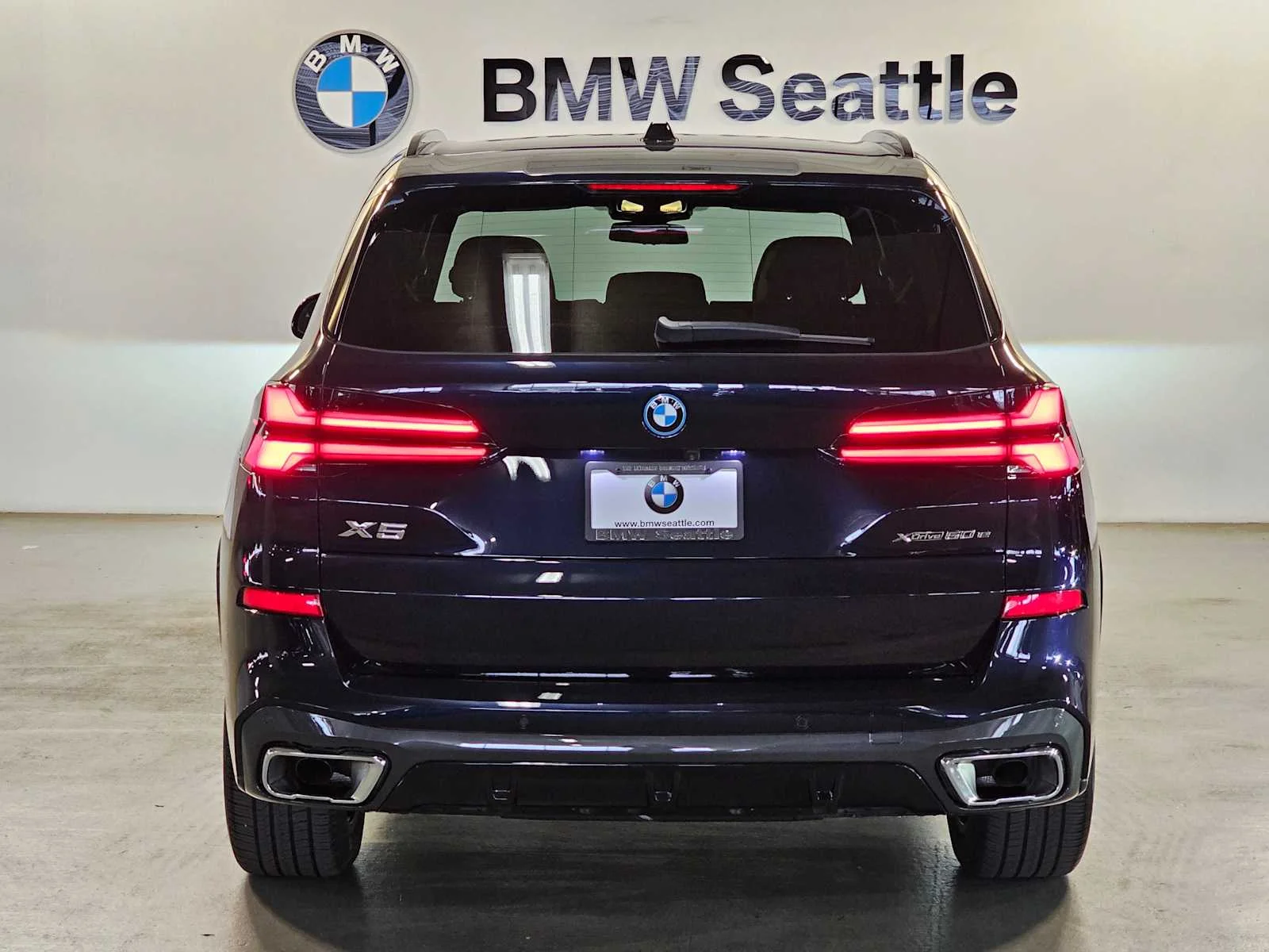 Used 2024 Carbon Black Metallic BMW xDrive50e image 5