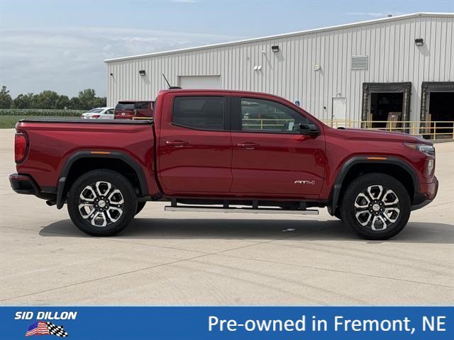 Used 2024 Volcanic Red Tintcoat GMC 4WD AT4 image 3