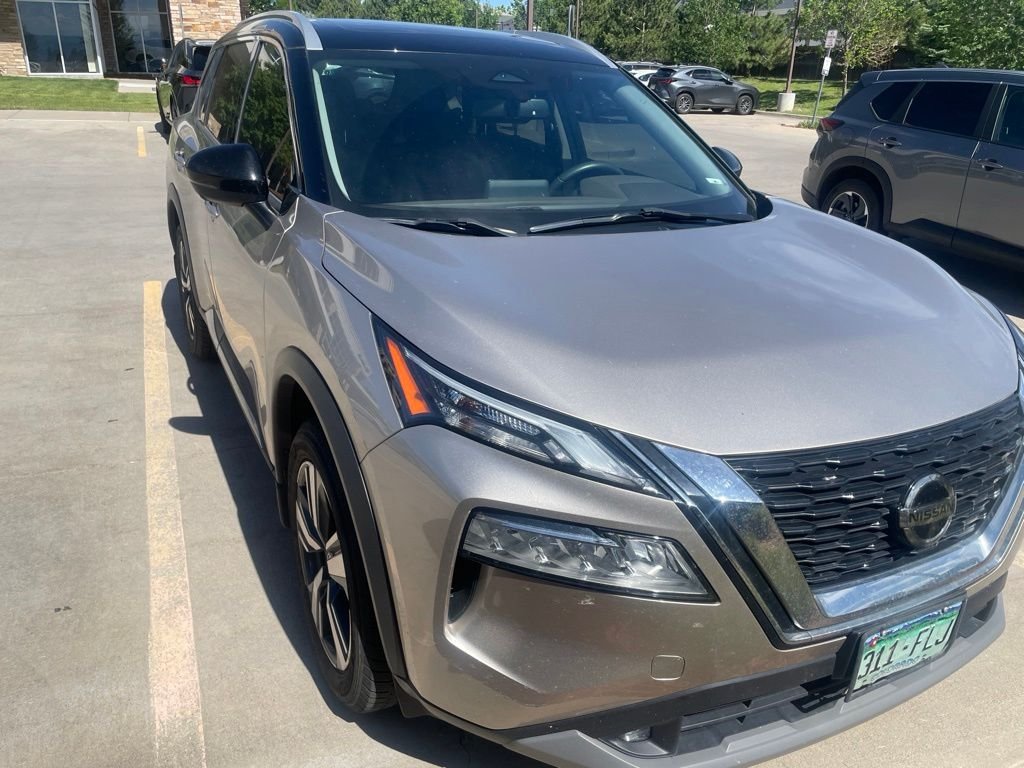 Used 2021 Gold Nissan SL image 1
